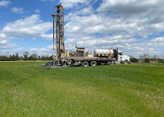 A Walters Well Drilling LLC professional drill rig performing a deep-bore vertical loop installation for a residential geothermal heating and cooling system in South Central Pennsylvania.